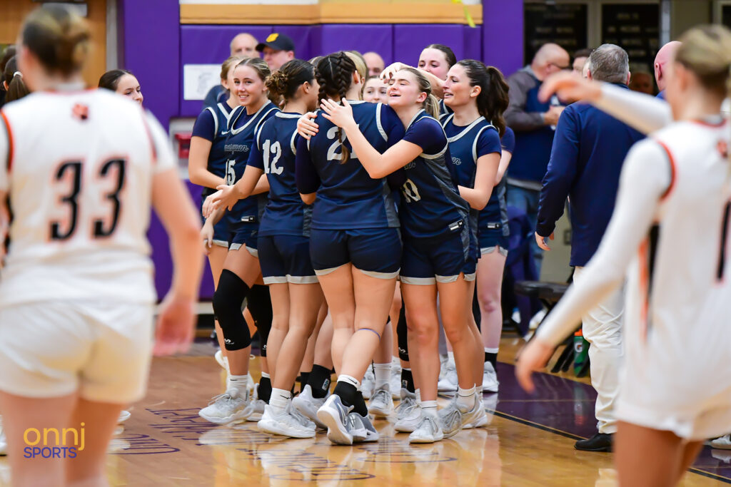 Manasquan girls basketball celebrates winning their 2025 NJSIAA Group 2 semifinal game.
